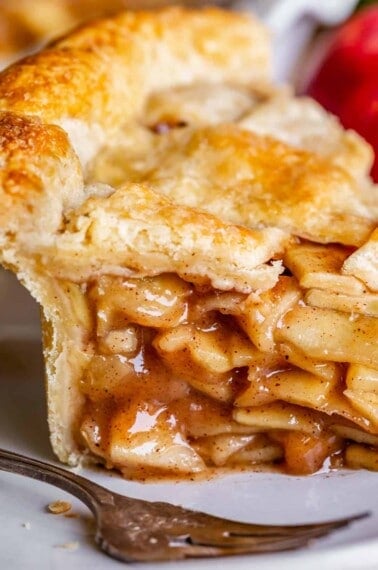 best apple pie recipe in the world, sliced on a plate