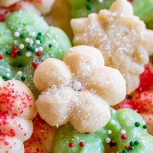 green and white spritz cookies with sprinkles