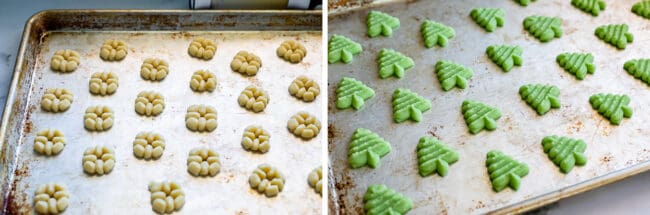 white and green spritz cookie dough shapes lined up on baking sheets.