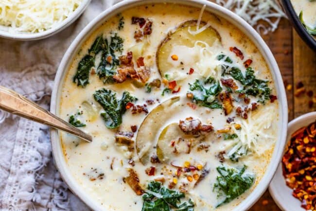 Zuppa toscana copycat recipe in a white bowl shot from overhead