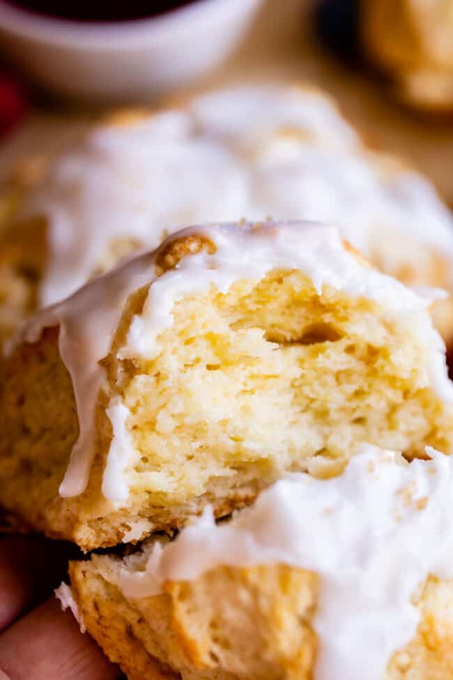 inside of a glazed scone showing flaky layers.