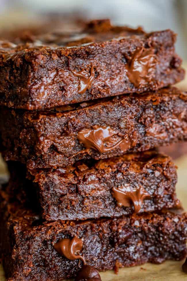 stack of four gooey chocolate brownies.