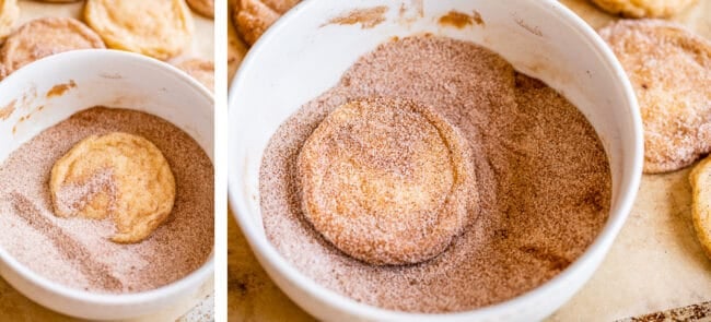 baked cookie being dipped in cinnamon sugar.