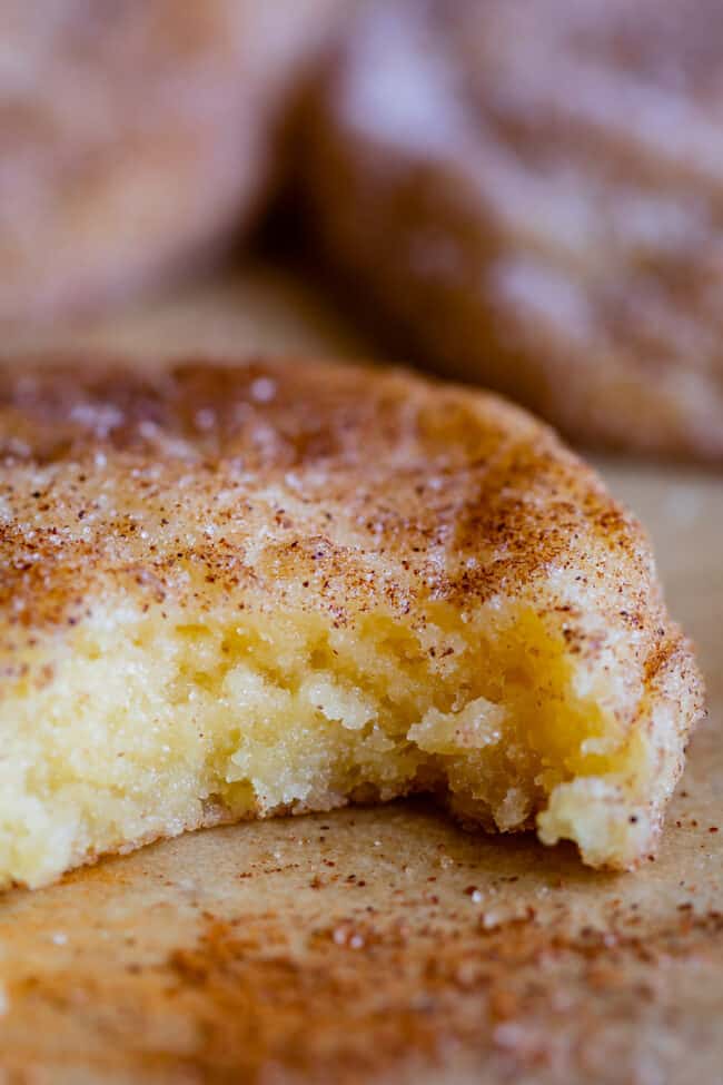 soft snickerdoodle cookie with a bite taken out.