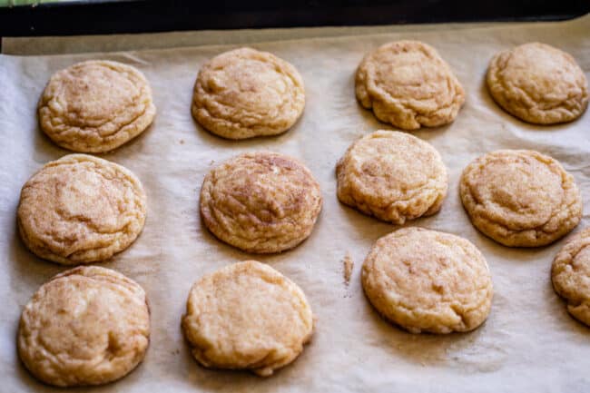 a pan of snickerdoodle cookies with cinnamon