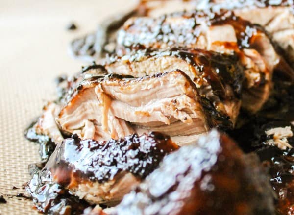 tender brown sugar balsamic pork on a baking mat.