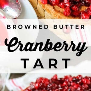 A close-up of a cranberry tart with a golden crust, topped with shiny red cranberries. One slice has been cut and removed, revealing the tart’s vibrant cranberry filling.