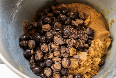 mixing chopped chocolate-covered sea salt butterscotch caramels into brown butter cookie dough.