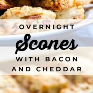 A plate of golden, rectangular overnight bacon scones with visible cheddar pieces, stacked in front of blurred holiday lights, with the text “Overnight Scones with Bacon and Cheddar.”.