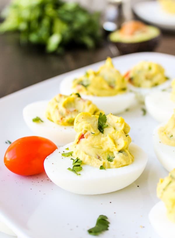 Deviled Guacamole Eggs from TheFoodCharlatan.com