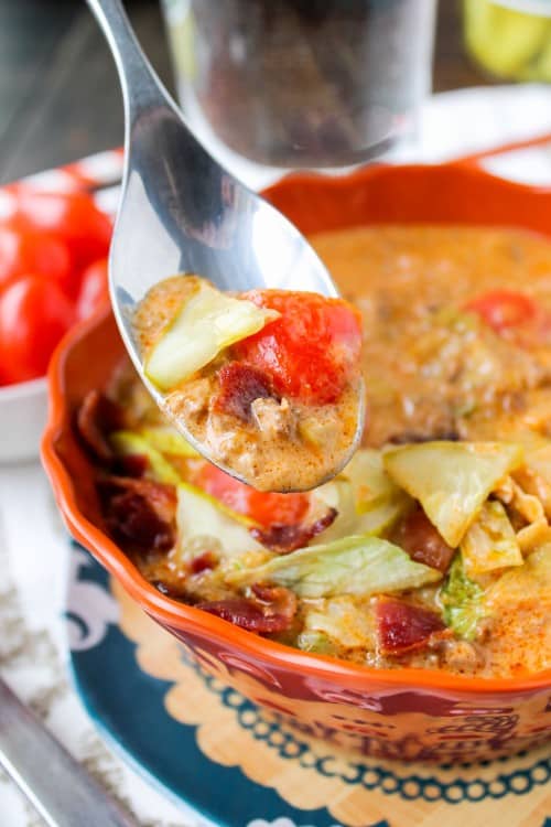 cheeseburger soup in a bowl shot from the side. 