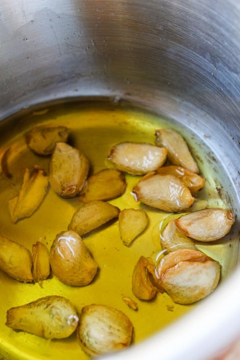 garlic cloves in oil to make garlic sauce for meatloaf. 