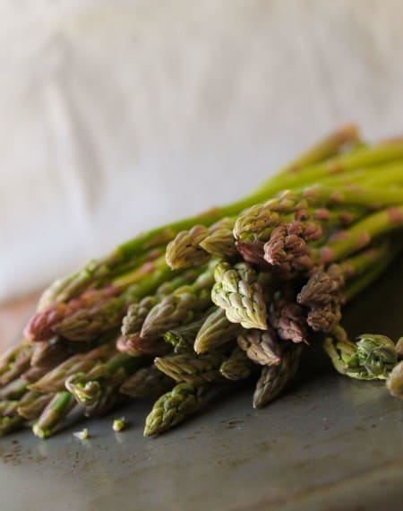 asparagus on a cutting board.