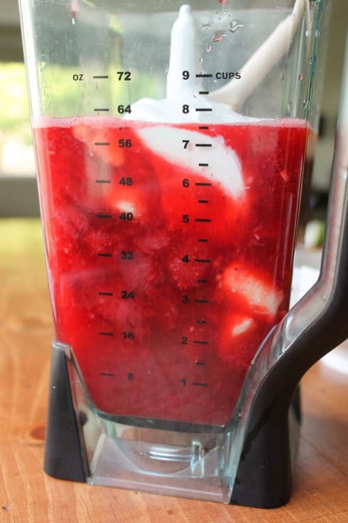 Ingredients for strawberry banana jello in a blender ready to be mixed.