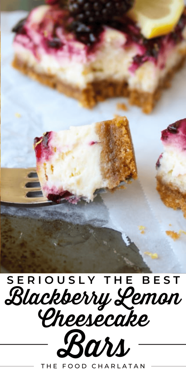 lemon blackberry cheesecake bars with a bite on a fork.