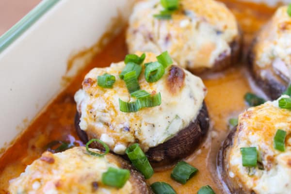 Bacon Blue Cheese Stuffed Mushrooms with Creamy Hot Sauce | TheFoodCharlatan.com // These are perfect (and easy!) appetizers for football watching!