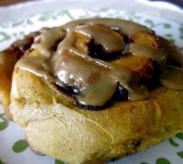 Pumpkin Cinnamon Rolls with Caramel Frosting from The Food Charlatan