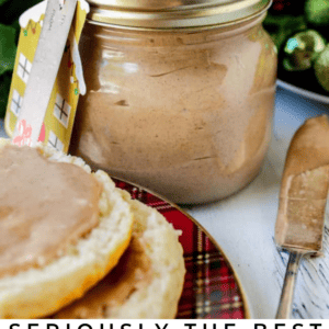 A jar of creamy cinnamon honey butter with a decorative tag sits beside biscuits on a festive plate; holiday greenery is in the background. Text reads: Irresistible Cinnamon Honey Butter, perfect for Christmas.