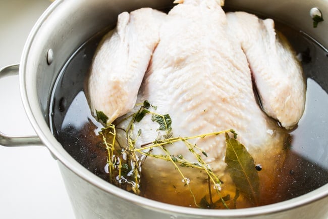 Brining a turkey in stockpot.