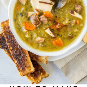 a bowl of split pea soup with toast strips.