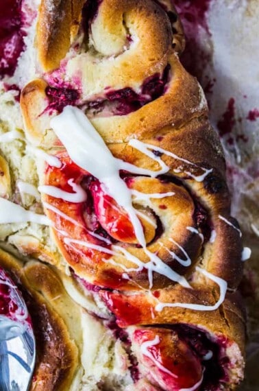 Raspberry Sweet Rolls with Coconut Cream Cheese Frosting from The Food Charlatan