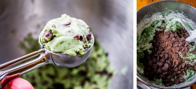 Scooping mint dough into balls with cookie scoop, adding chocolate to dough in bowl