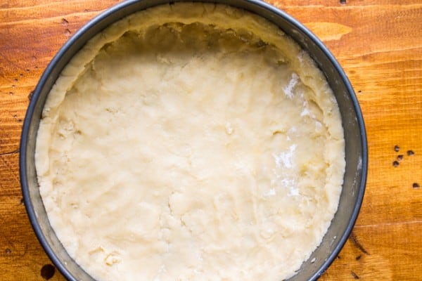 shortbread crust pressed into a springform pan.