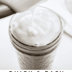 A jar being filled with creamy coconut syrup pouring from a jug, with text reading Quick & Easy Homemade Coconut Syrup - The Food Charlatan. Enjoy rich coconut flavor in every pour.