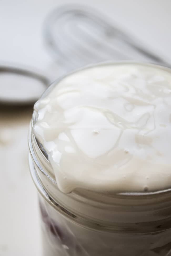 a jar of homemade coconut syrup.