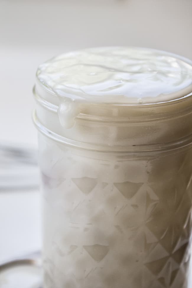 a jar of homemade coconut syrup.