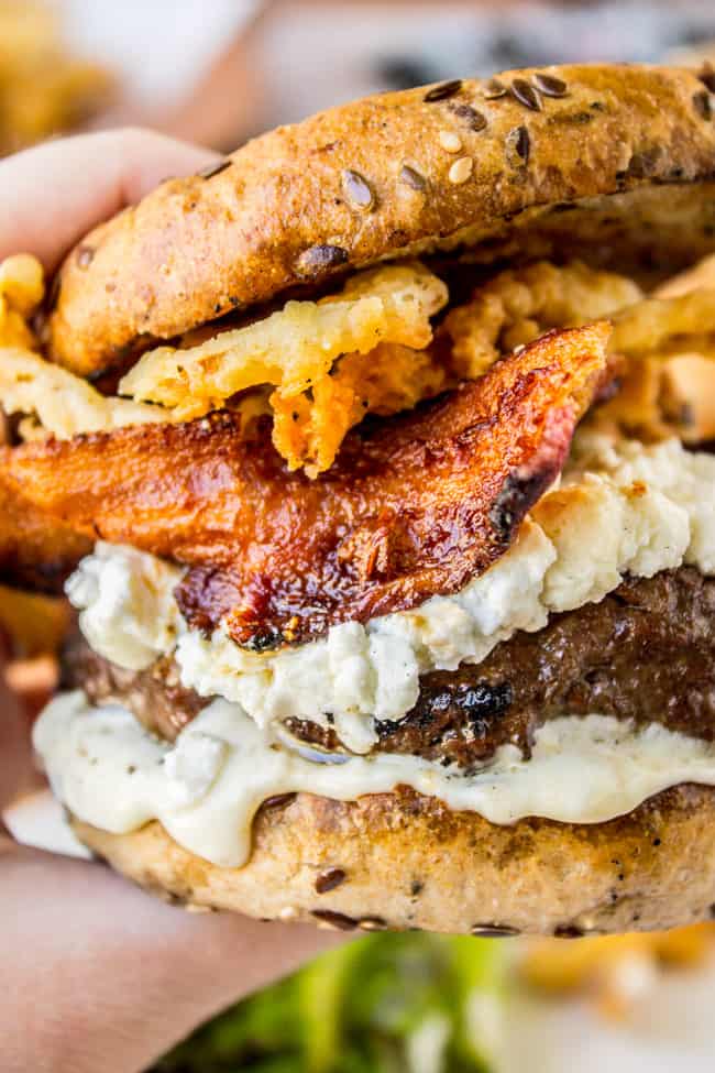 Bacon and Goat Cheese Aioli Burger with Crispy Onions from The Food Chatrlatan