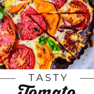 A tasty tomato tart topped with fresh basil, with text reading Tasty Tomato Tart, Makes 6 Servings, The Food Charlatan.