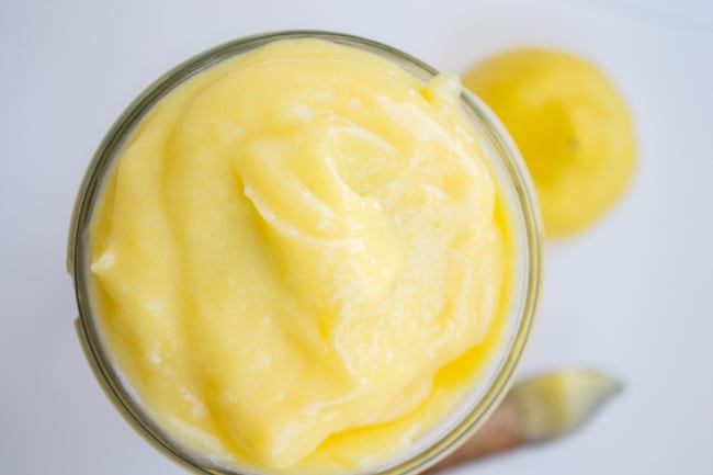 a glass jar of lemon curd. 