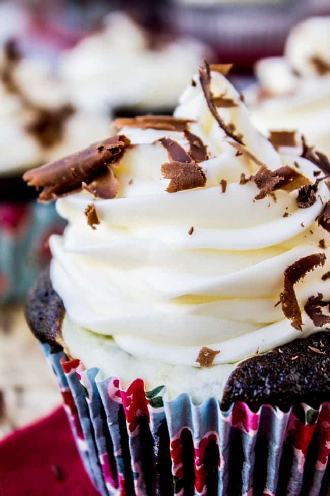 chocolate cupcake with cream cheese filling and cream cheese frosting, chocolate curls.