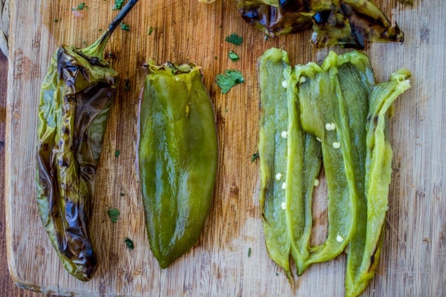 Splitting the roasted Jalapeno chiles