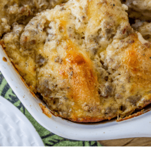 overnight biscuit and gravy casserole in a white dish.