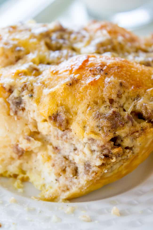 biscuit and gravy breakfast casserole on a white plate.