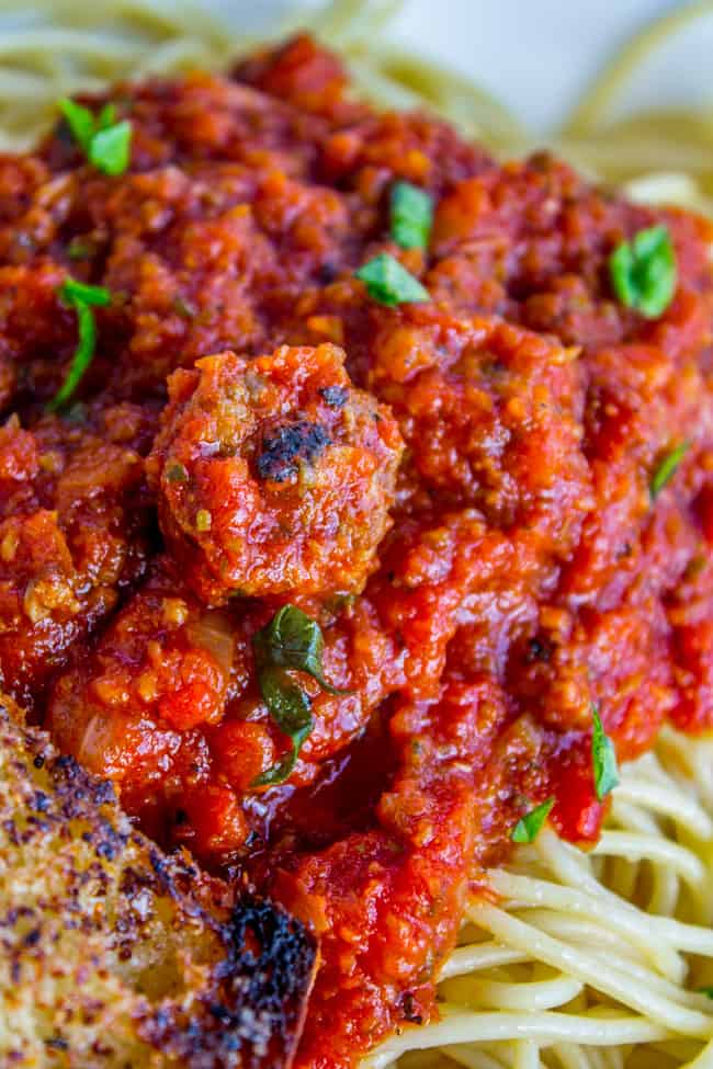 Spaghetti sauce with fresh basil and Italian sausage served over pasta. 