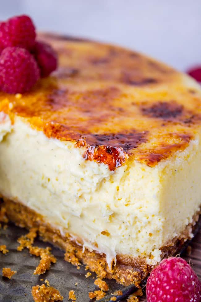 Crème Brûlée Cheesecake with fresh raspberries.