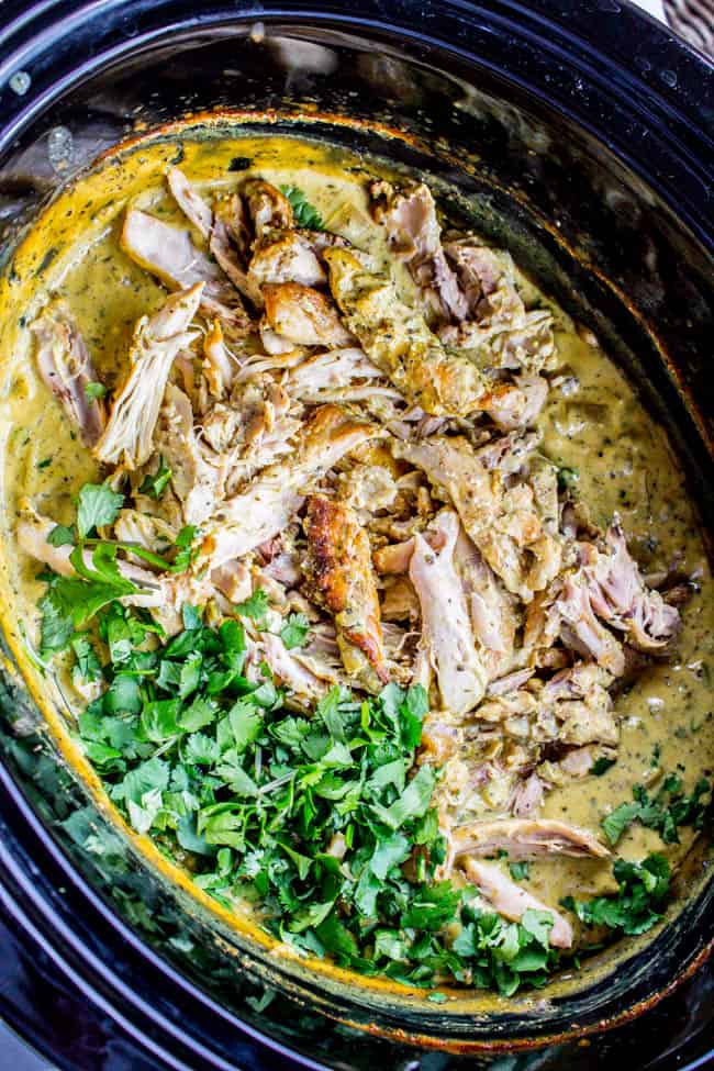 basil chicken coconut curry in the slow cooker with fresh cilantro. 