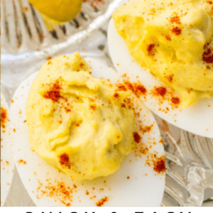 classic deviled eggs on a glass platter.