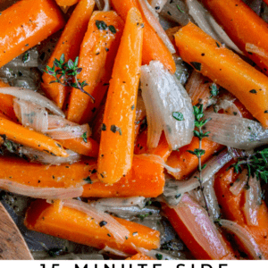 Close-up of sautéed carrot sticks and shallots garnished with fresh herbs in a pan. Text at the bottom reads, 15 minute side sautéed carrots & shallots—perfect for holidays! Quick, flavorful, and festive from The Food Charlatan.