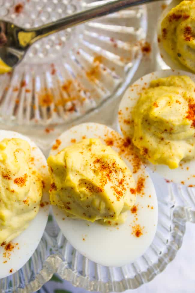 deviled eggs sprinkled with paprika.