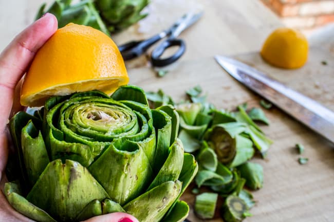 Garlic Roasted Artichokes with Pesto Dipping Sauce from The Food Charlatan