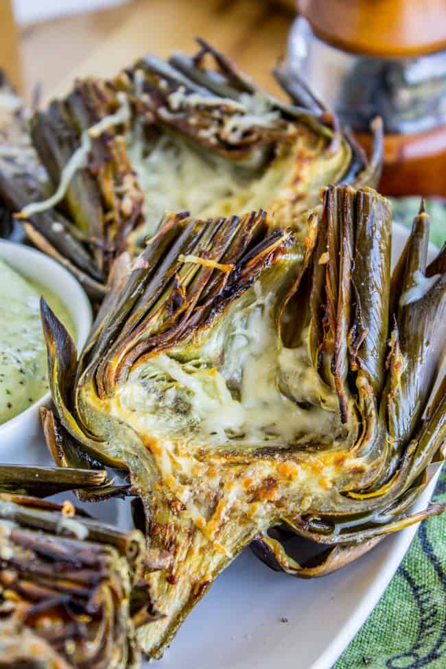 Garlic Roasted Artichokes with Pesto Dipping Sauce from The Food Charlatan