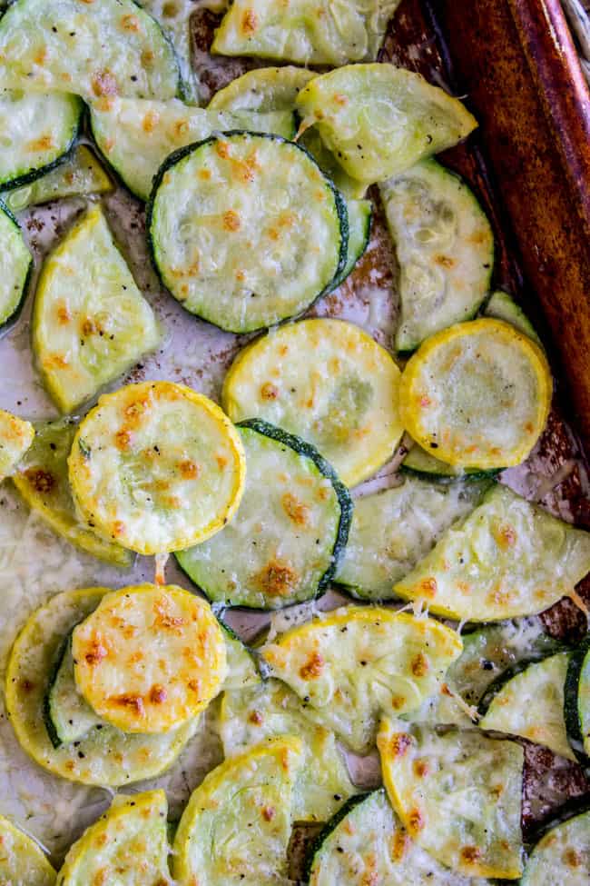 Parmesan zucchini and squash on a pan.