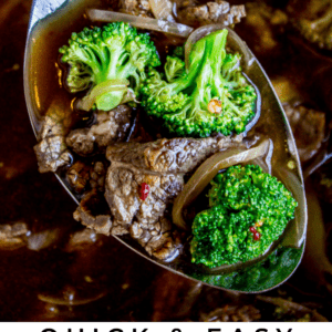 A close-up of a spoonful of savory beef and broccoli soup with sliced beef, fresh broccoli florets, and flavorful broth, held above a bowl. Text below reads: Quick & Easy Beef and Broccoli Soup – The Food Charlatan.