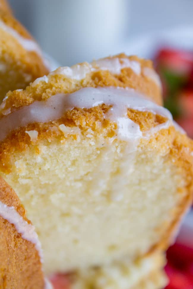 cream cheese pound cake with vanilla glaze shot from close up. 