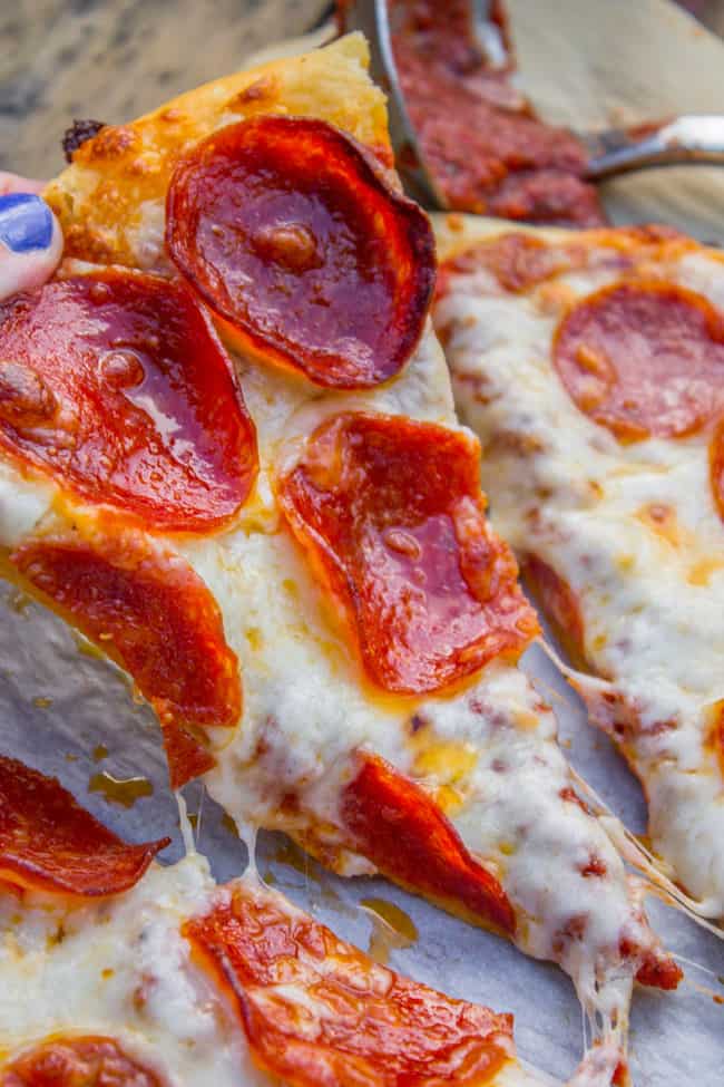 slices of homemade pizza with pepperoni.