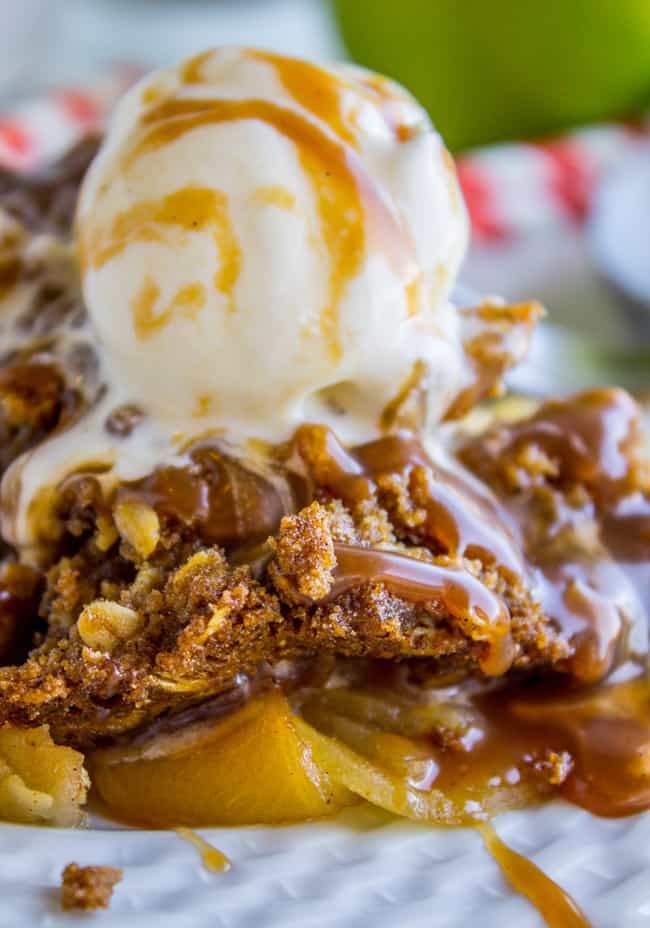 homemade apple crisp with oats with caramel and ice cream.